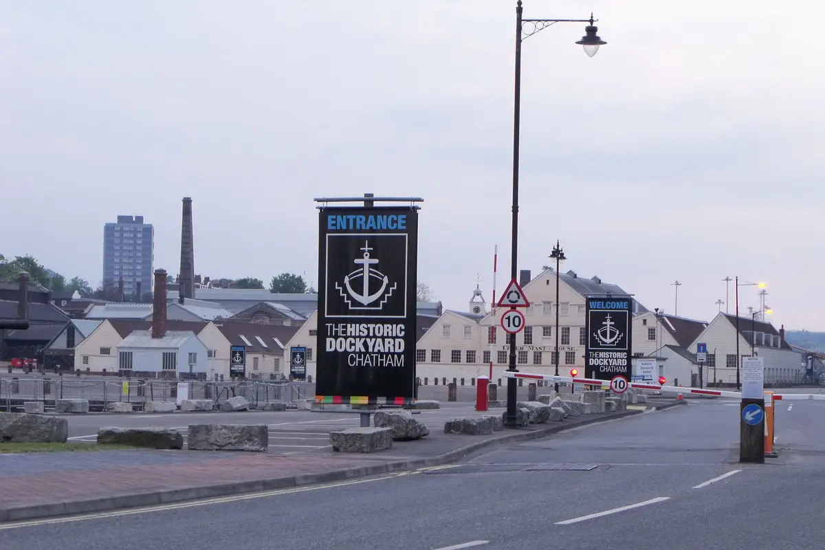 The entrance to Chatham Historic Dockyard, with the dockyard buildings behind.
